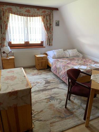 Postel nebo postele na pokoji v ubytování Pokoje u Zofii