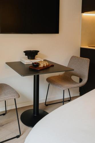 Postel nebo postele na pokoji v ubytování Raibu Antwerp by StayC