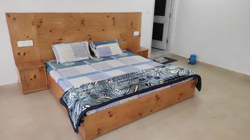 Ένα ή περισσότερα κρεβάτια σε δωμάτιο στο Hills Paradise Home Stay