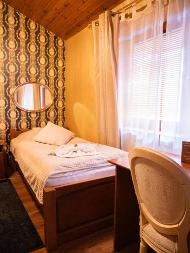 Una cama o camas en una habitación de U Krba