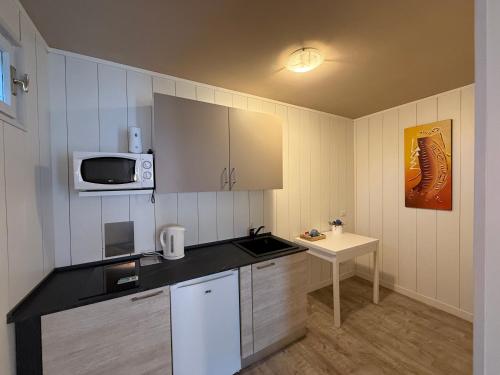 Η κουζίνα ή μικρή κουζίνα στο Residence Venezia Park - ENJOY HOLIDAY
