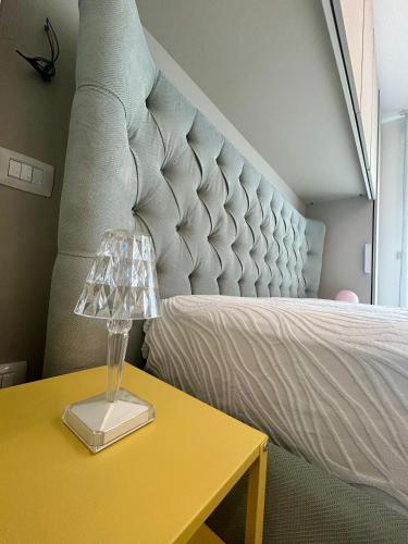 a bedroom with a bed and a table with a lamp at Vista mare in Vasto