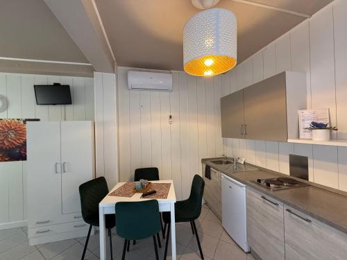 Η κουζίνα ή μικρή κουζίνα στο Residence Venezia Park - ENJOY HOLIDAY