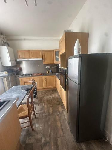 Køkken eller tekøkken på T4 chaleureux en plein centre