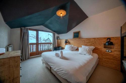Postel nebo postele na pokoji v ubytování Alpeen Hotel