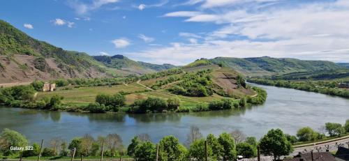 a river with mountains in the background at Zw -Maria Laach und Nürburgring in Mayen