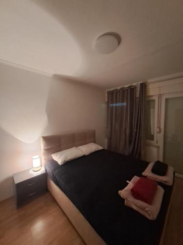 Postel nebo postele na pokoji v ubytování Apartman -stan na dan-