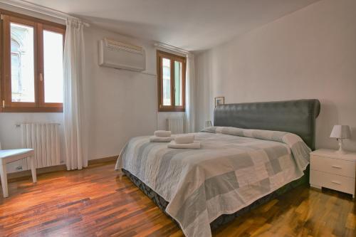 Кровать или кровати в номере Da Bruno Homes
