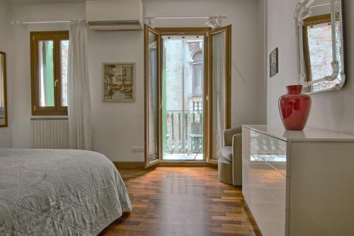 Кровать или кровати в номере Da Bruno Homes