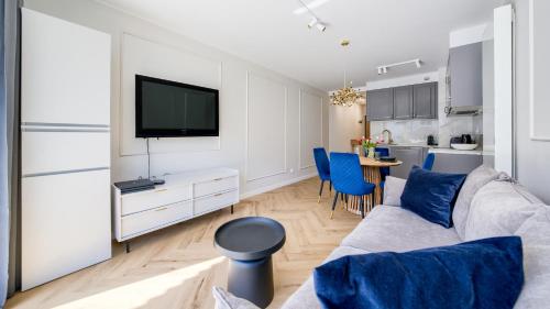 Μια τηλεόραση ή/και κέντρο ψυχαγωγίας στο Apartamenty Bryza, Sun & Snow