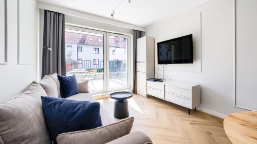 Μια τηλεόραση ή/και κέντρο ψυχαγωγίας στο Apartamenty Bryza, Sun & Snow