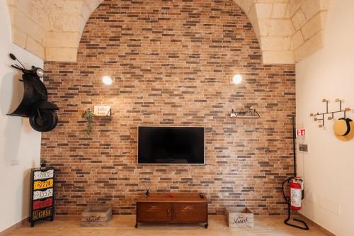 TV a/nebo společenská místnost v ubytování Lulù House