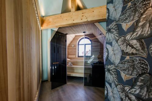 a room with a hallway with a wall with a butterfly pattern at 4K in Wangen im Allgäu