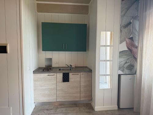 Η κουζίνα ή μικρή κουζίνα στο Residence Venezia Park - ENJOY HOLIDAY