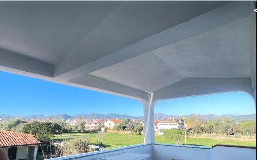 a view from a window of a house at DreamHouse Miramare in Budoni