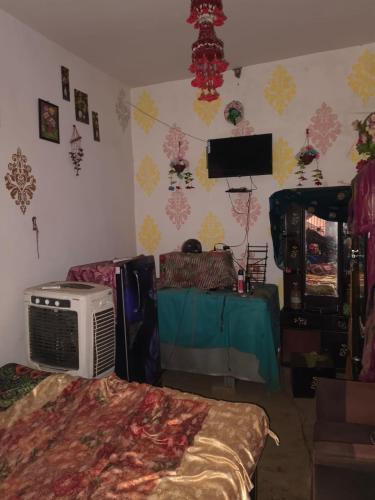 Η κουζίνα ή μικρή κουζίνα στο Arvind Homestay