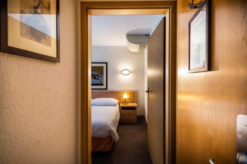 Katil atau katil-katil dalam bilik di Residence - Cityzen - Geneve