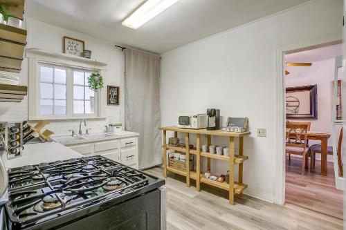 a kitchen with a stove top oven in a room at Granbury Getaway - 3 Bedroom in Granbury
