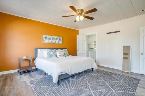 a bedroom with a bed and a ceiling fan at Granbury Getaway - 3 Bedroom in Granbury