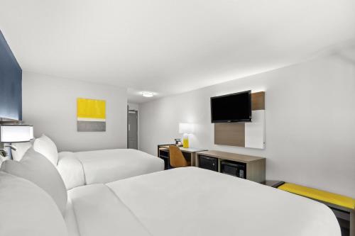 TV o dispositivi per l'intrattenimento presso Comfort Inn & Suites Rome South