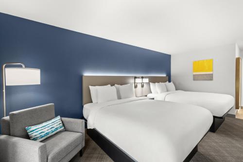 Letto o letti in una camera di Comfort Inn & Suites Rome South
