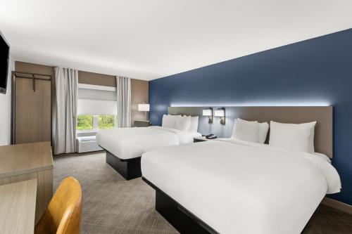 Letto o letti in una camera di Comfort Inn & Suites Rome South