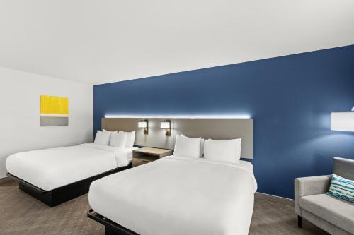 Letto o letti in una camera di Comfort Inn & Suites Rome South