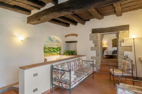a living room with a couch and a table at Universal Harmony - Nibbio in Dicomano
