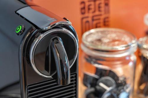 a close up of a toaster next to a glass jar at Elegant in Aschaffenburg