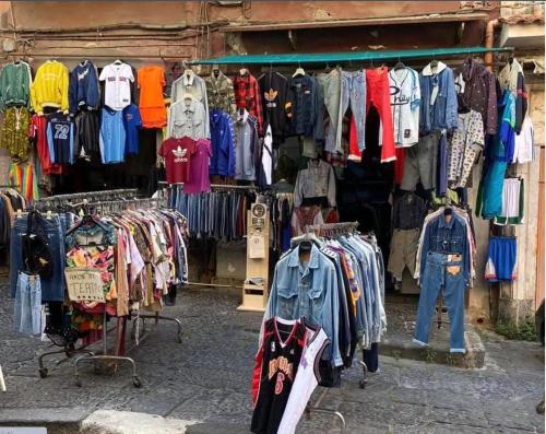 a store with a bunch of clothes on display at B&B Italia in Ercolano