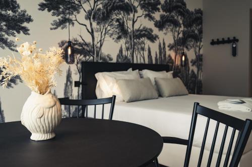 Кровать или кровати в номере Van der Valk Hotel Bloom Saint Aygulf