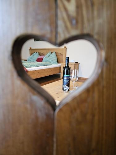 Ein Bett oder Betten in einem Zimmer der Unterkunft Weingut Buschenschank Schneiderannerl