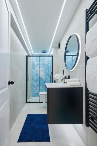 a bathroom with a sink and a mirror at Apartment Ivan in Pomorie
