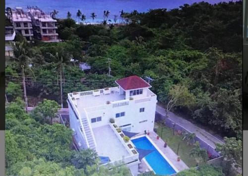 an aerial view of a building with a swimming pool at Beautiful house in Boracay Aklan in Boracay