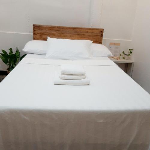 Ένα ή περισσότερα κρεβάτια σε δωμάτιο στο Sundown Private Studio Rooms