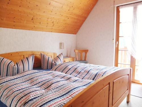 Postel nebo postele na pokoji v ubytování Ferienwohnungen Vogt's Libding