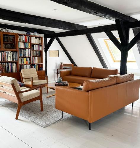 Χώρος καθιστικού στο Panorama-Loft Fehmarn mit Meerblick