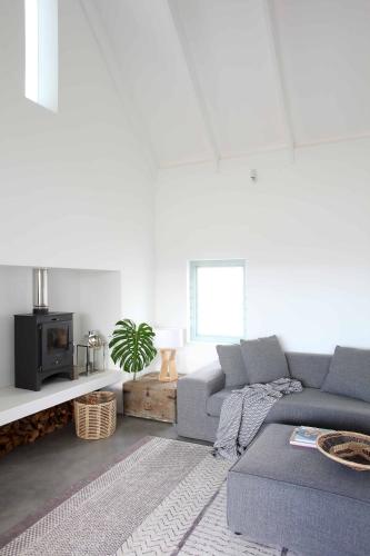 Posezení v ubytování The Cottage Collection Paternoster
