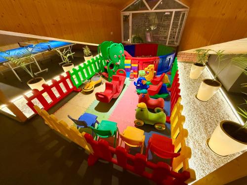 an aerial view of a childs play area with toys at ARNISA Kasauli - A Boutique Hotel in Kasauli