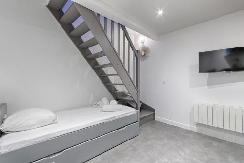 Photo de la galerie de l'établissement Appartement de charme au coeur des Batignolles, à Paris