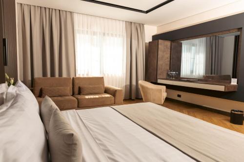 Postel nebo postele na pokoji v ubytování Venus Hotel