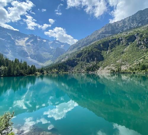 a view of a lake in the mountains at Elegance Mountain Attic with sauna Edolo Ponte di Legno in Edolo