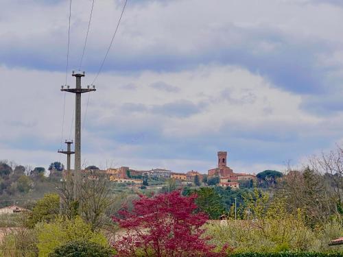 a view of a city with a power pole at Villa Rosa in Montecarlo