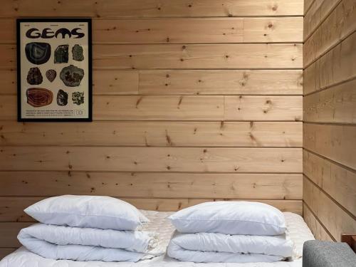 Postel nebo postele na pokoji v ubytování Ruka Vuosselin Helmi C7