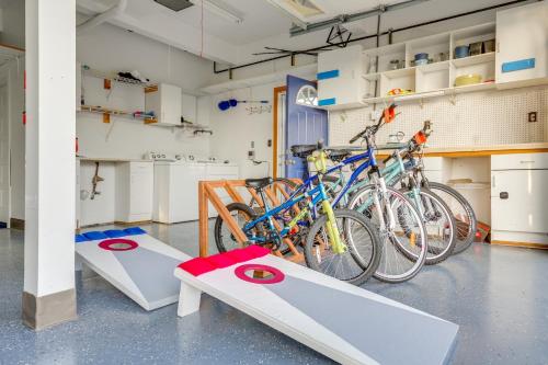 a group of bikes parked in a garage at Walk to Water Camano Home with Ocean-View Deck in Camano