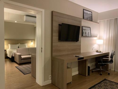 Una cama o camas en una habitación de Staybridge Suites São Paulo by IHG