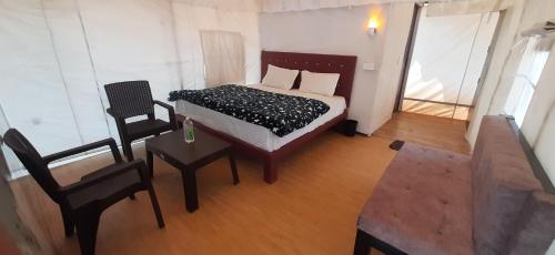 Katil atau katil-katil dalam bilik di Green View Cottages
