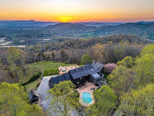 an aerial view of a home in the mountains at The Albatross Estate & Golf Links in Fletcher