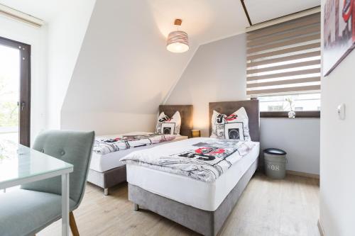 Ένα ή περισσότερα κρεβάτια σε δωμάτιο στο MY Messe & Business Home - Refrath