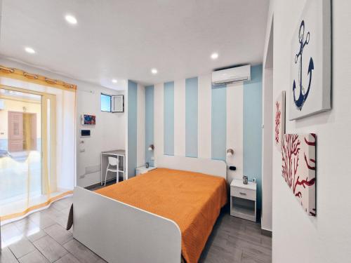 Postel nebo postele na pokoji v ubytování Casa Mo'